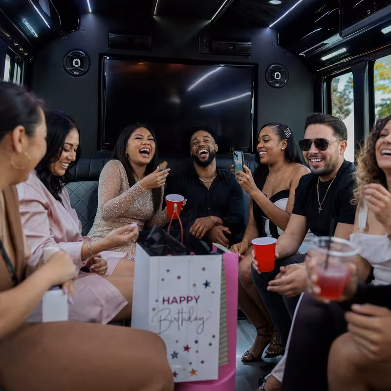Black Mercedes Sprinter van staged for an Dallas Birthday Transportation group