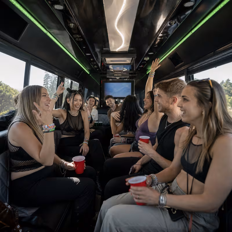 Passengers loading luggage while boarding an Dallas group shuttle