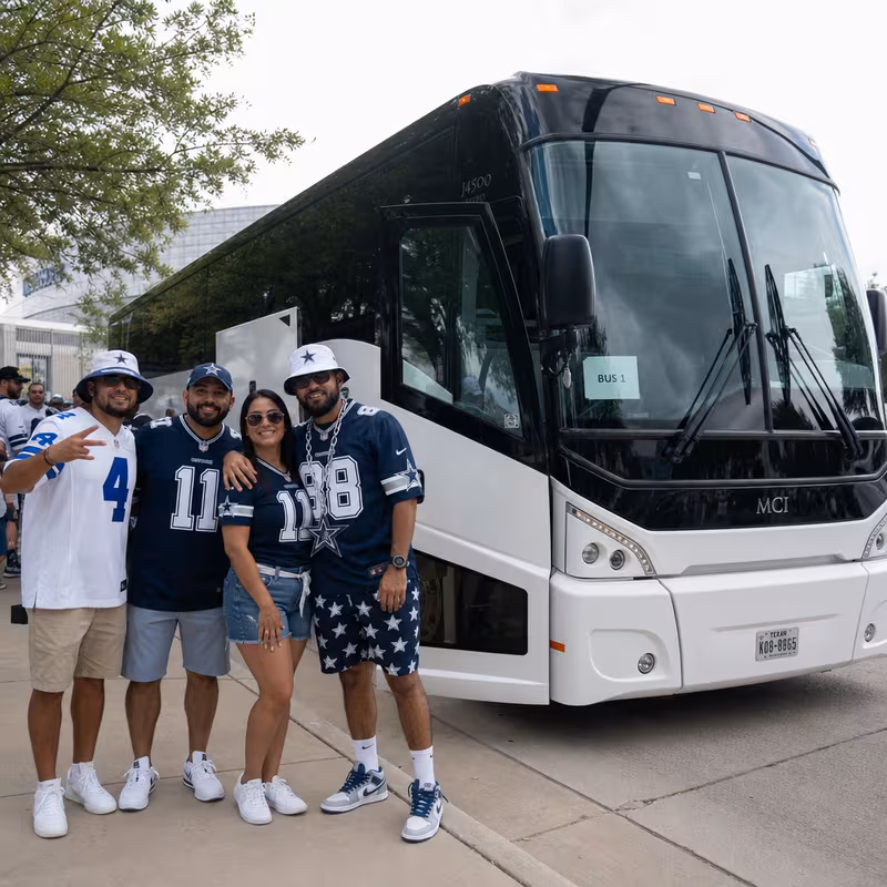 Passengers loading luggage while boarding an Dallas group shuttle